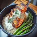 Grilled Salmon, Asparagus, and Quinoa Bowl with Lemon Dill Sauce